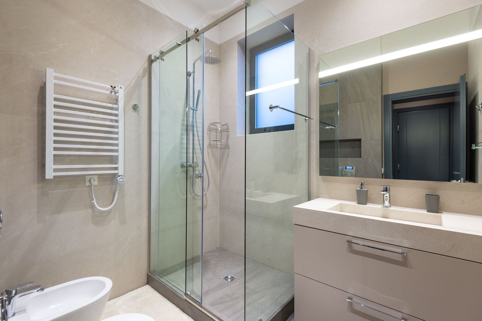 Showers and wet rooms, matched to the pressure the house can actually deliver — which is the difference between a rainfall head and an expensive dribble.